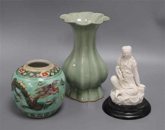 A Celadon glazed vase, a blanc de chine figure and a dragon jar vase 21cm